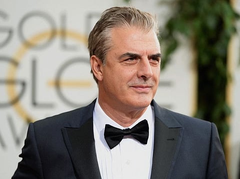 In this file photo actor Chris Noth attends the 71st Annual Golden Globe Awards. He is the latest celebrity to be accused of sexual assault.