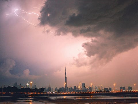 The Light-1 nanosatellite will study terrestrial gamma ray flashes from thunderstorms, such as this one seen here in a file photo of the Burj Khalifa in Dubai silhouetted against the night sky during a thunderstorm. Photo for illustrative use only.