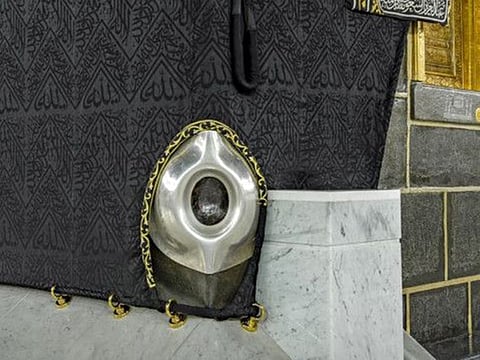 The reddish-black, oval-shaped stone is 30cm in diameter and is located in the southeast corner of the Kaaba.