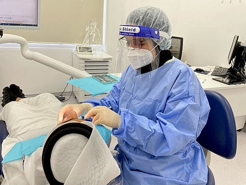 Dr Hiba Abu Al Nasar, specialist prosthodontist at Al Dhafra Dental Center — Ambulatory Healthcare Services.
