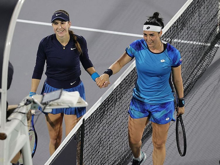 Tunisia's Ons Jabeur shakes hands with Switzerland's Belinda Bencic after their match in Abu Dhabi