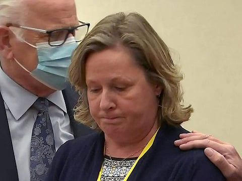 Kimberly Potter, a former police officer, who has said she mistakenly used her handgun instead of her Taser when firing at Daunte Wright, 20, as he attempted to flee in his car following a traffic stop, reacts on a guilty verdict in a still image from video in Minneapolis, Minnesota, U.S. December 23, 2021.