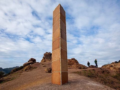 A gingerbread monolith stands on Christmas Day on a bluff in Corona Heights Park overlooking San Francisco.  