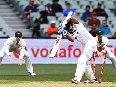 India's Prithvi Shaw is clean bowled by Australia's paceman Mitchell Starc on the first day of the first Test match in Adelaide on December 17, 2020.   