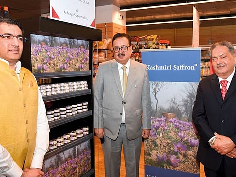 From left: Dr Aman Puri, Shri Navin Choudhary and Kamal Vachani seen during the launch of Kashmiri saffron at the Al Maya Supermarket store in Dubai