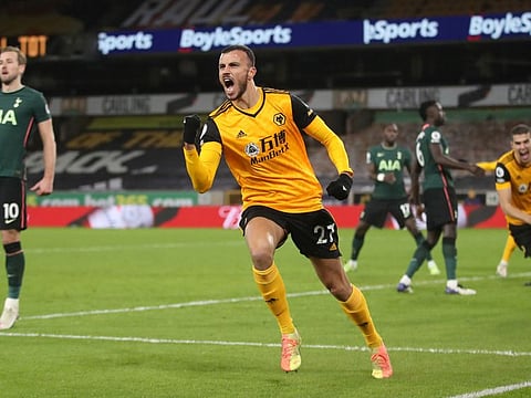 Wolverhampton Wanderers' Romain Saiss celebrates scoring their late equaliser against Jose Mourinho's Tottenham Hotspur in a late game on Sunday.