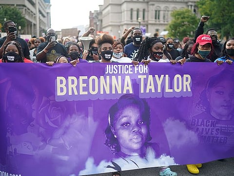 Demonstrators in Louisville, Ky., on Sept. 25, 2020, who  called for more officers to be fired and charged following the death of Breonna Taylor, who was killed by the police. Detective Joshua Jaynes, who prepared the search warrant for the botched raid, received notice that he would be terminated, more than nine months after the operation.