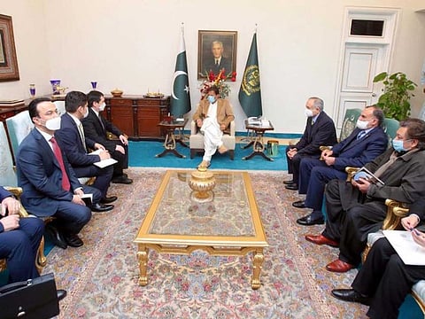 Uzbekistan’s Minister for Transport Makhkamov Ilkham calls on Prime Minister Imran Khan in Islamabad on December 29, 2020.