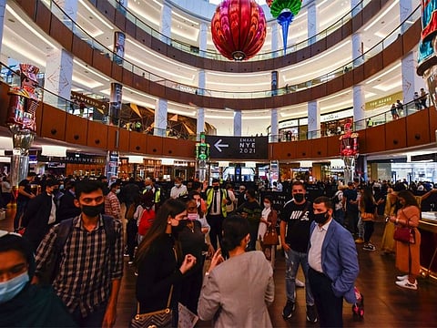 A file photo of people gathering at the Dubai Mall to witness fireworks in Burj Khalifah on New Years Eve to welcome 2021.