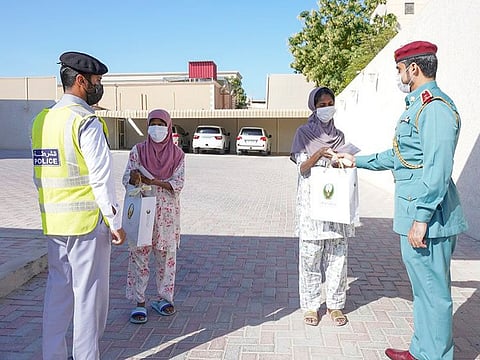 Ajman Police presenting gifts to domestic workers recently 