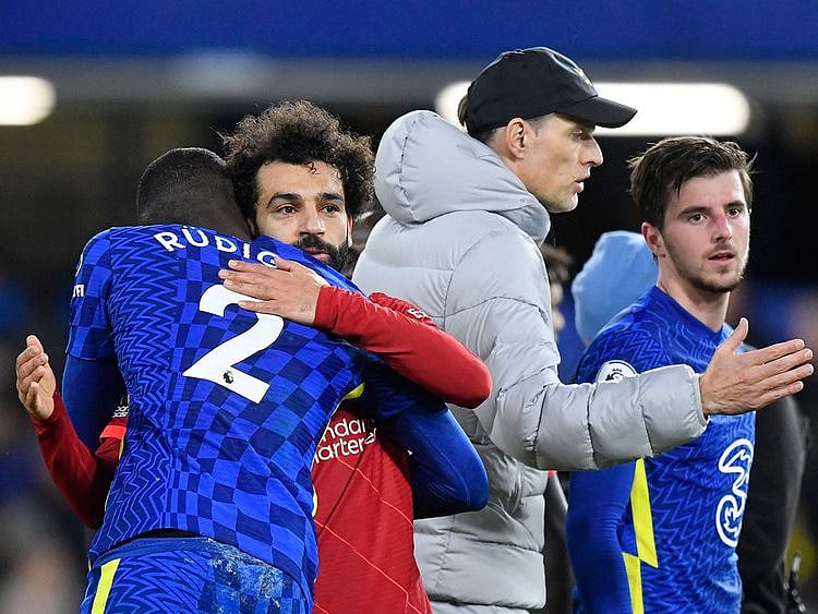 Liverpool's Mohamed Salah and Chelsea's Antonio Rudiger embrace after the match 