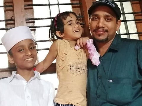 Mohammed Shareef with his children before the accident.