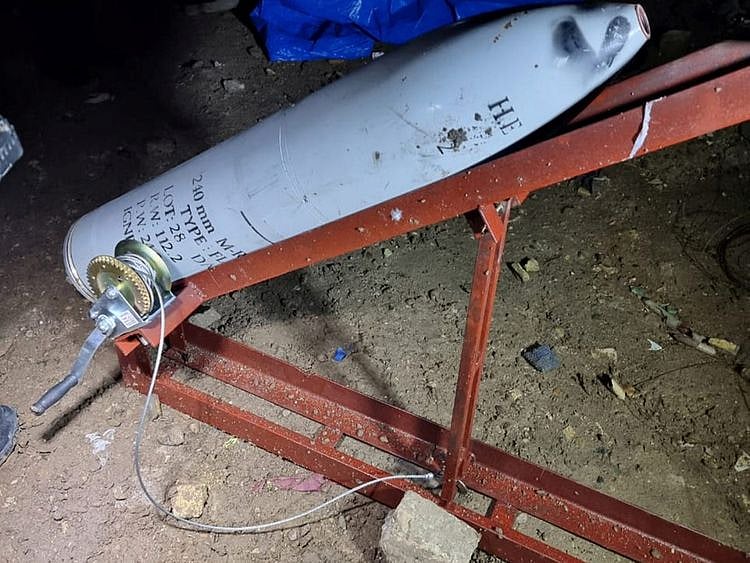 An unfired rocket found by the Iraqi Army is pictured after a Katyusha rocket hit an Iraqi military base hosting US forces near Baghdad's international airport, in Baghdad, on Wednesday.