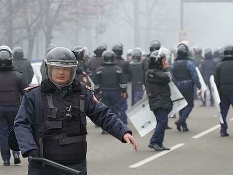  Police fired stun grenades and tear gas at a crowd of several thousand protesters in Almaty 