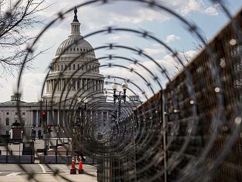 The US Capitol is seen through razor wire in Washington, U.S., March 4, 2021.