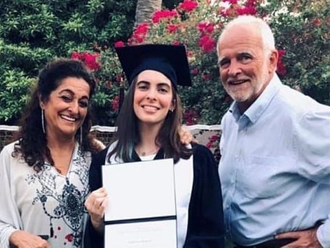 Gina Bagnulo with her parents.