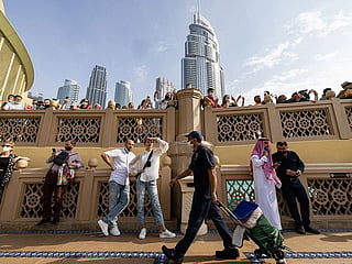 Tourists near the fountain area of the Dubai Mall. 