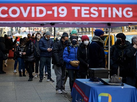 People wait to receive a COVID-19 test on January 4, 2022, in New York. 