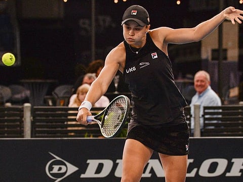 Australian Ash Barty hits a backhand return to Sofia Kenin of the US at the Adelaide International WTA singles tournament on Friday.