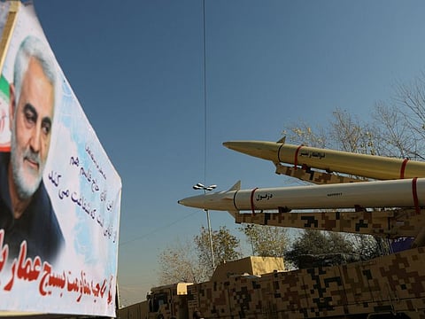Missiles of the kind used during Iran's retaliatory strike on the US Ain Al Asad military base in 2020 are seen on display at Imam Khomeini Grand Mosalla in Tehran on January 7, 2022. 