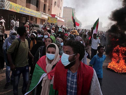 People chant slogans during a protest in Khartoum, Sudan, on January 6, 2022. 