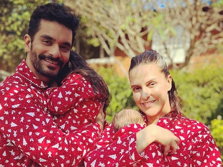 Angad Bedi and Neha Dhupia with their kids