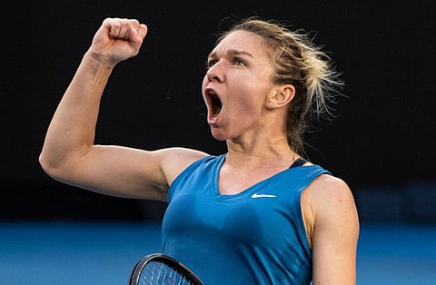 Simona Halep of Romania celebrates after winning the Melbourne Summer Set 1 title defeating Veronika Kudermetova of Russia in Melbourne on Sunday.