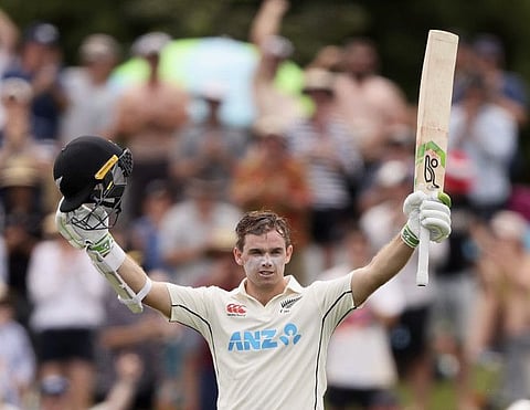 Tom Latham of New Zealand celebrates his century during day one of the second Test against Bangladesh at Hagley Oval in Christchurch on Sunday.