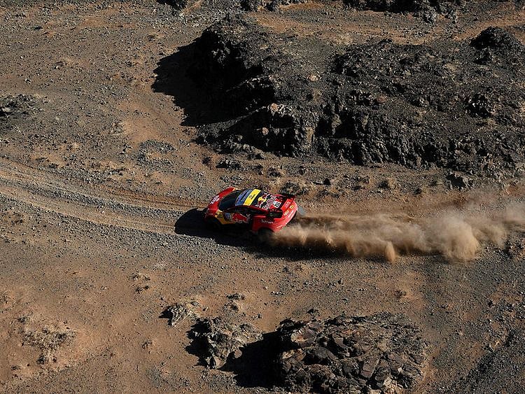 Sebastien Loeb and co-driver Fabian Lurquin compete during Stage 7 of the Dakar Rally