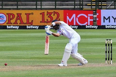 Indian skipper Virat Kohli hits a straight-drive four during the first day of the third Test against South Africa at Newlands in Cape Town on Tuesday.