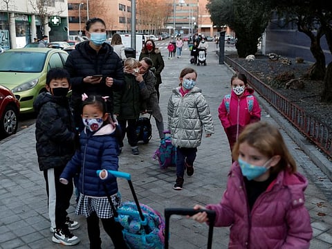 Children go back to school after the Christmas break amid the coronavirus disease (COVID-19) surge in Madrid, Spain, on January 10, 2022. 