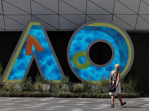 A person walks through Melbourne Park in the lead-up to the Australian Open in Melbourne, Australia.