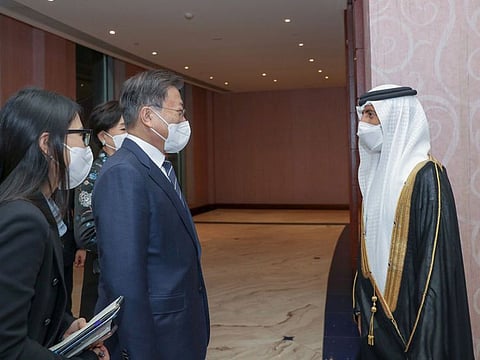 Moon Jae-in, President of South Korea, received by Suhail bin Mohammed Al Mazrouei (R), Minister of Energy and Infrastructure in UAE on Saturday