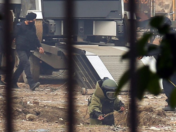 A member of a Bomb Disposal Squad at a site where an improvised explosive device (IED) was found inside a bag, at Ghazipur flower market, in New Delhi on January 14.