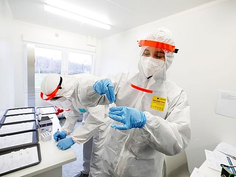 A medical worker examinse the rapid antigen tests for the coronavirus in Prague, Czech Republic. File photo used for illustrative purposes.  