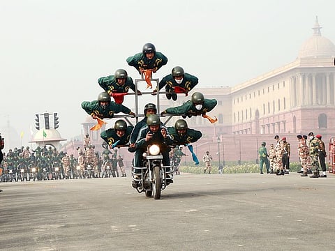 ITBP personnel show their skills during the rehearsal for the Republic Day Parade, at Vijay Chowk, in New Delhi on Tuesday. 