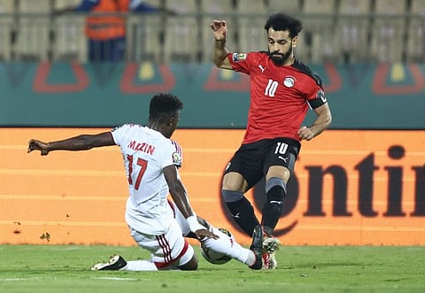 Egypt's forward Mohamed Salah (right) challenges Sudan's defender Mazin Mohamedein Alnour Mohamed during the Group D Africa Cup of Nations (AFCON) 2021 match at Stade Ahmadou Ahidjo in Yaounde.