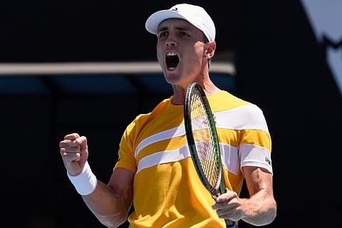 Christ O'Connell of Australia celebrates after defeating Diego Schwartzman of Argentina in their second round match at the Australian Open in Melbourne, Australia.