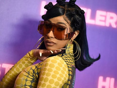 Cardi B arrives at a photo call for "Hustlers" on August 25, 2019, in Beverly Hills.