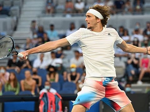 Germany's Alexander Zverev hits a return against Moldova's Radu Albot during their men's singles match on day five of the Australian Open tennis tournament in Melbourne.