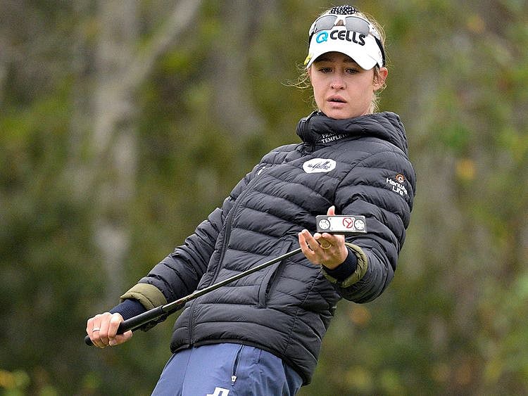 Nelly Korda reacts after missing a putt on the 16th green 