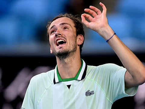 Russia's Daniil Medvedev reacts after a point against Maxime Cressy of the US during their men's singles match on day eight of the Australian Open tennis tournament in Melbourne.