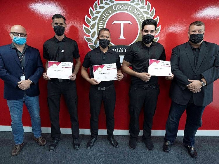 The three security guards were recognised and rewarded for their courage in saving the workers