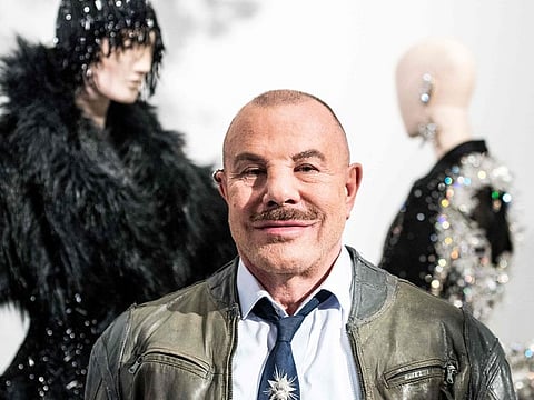 In this file photo taken on February 26, 2019, French fashion designer Thierry Mugler poses during the presentation of his exhibition "Couturissime" at the Montreal Museum of Fine Arts