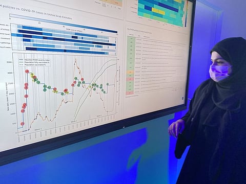 Hamda Al Blooshi, administrator at Ministry of Health and Prevention, at the ministry's pavilion at Arab Health 2022 in Dubai on Monday