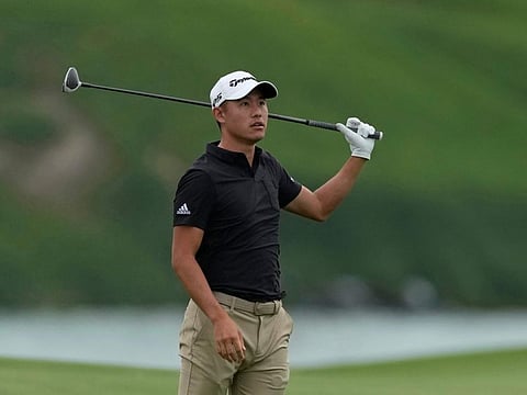 Collin Morikawa follows his ball during the Abu Dhabi Championship at the Yas Links last week. After a miserable outing, the world No 2 is ready to start fresh at the Dubai Desert Classic this week.
