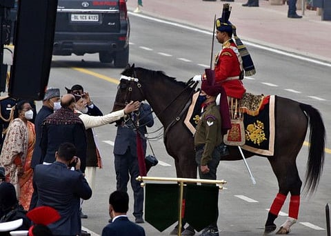 Prime Minister Narendra Modi accompanied by President Ram Nath Kovind and Defence Minister Rajnath Singh bid farewell to the 'Virat', a horse of President's Bodyguard, that retired from the services during the 73rd Republic Day Parade, at Rajpath, in New Delhi on Wednesday. 