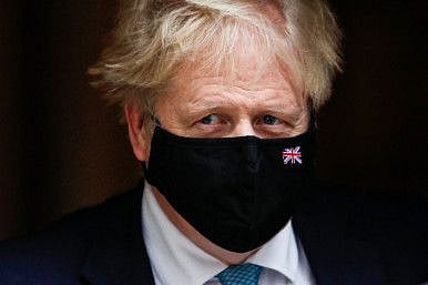 British Prime Minister Boris Johnson leaves the Downing Street in London, on January 26, 2022. 