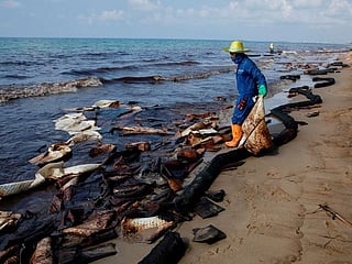 Photos: Thailand beach closes after oil spill washes ashore  