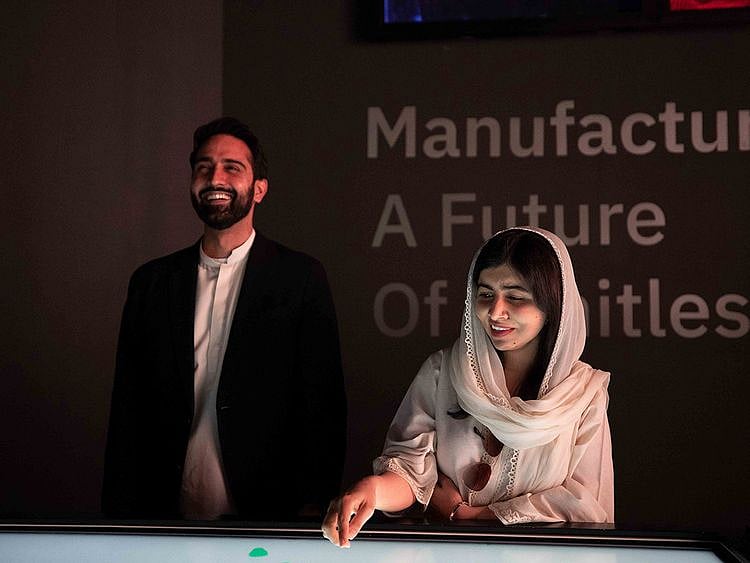 Malala-and-Asser--Malik-at-the-Pakistan-Pavilion-(1)-1643442455157